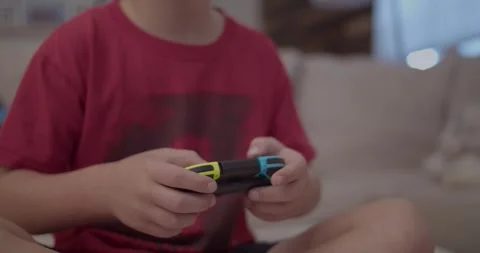 Boy Playing With Video Game Controller Video stock 253741190