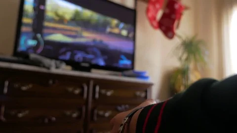 The boy is playing video games Stock Footage 85447840