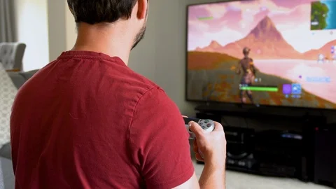 Boy playing video games at home Stock Footage 92246653