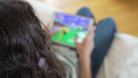 Boy playing video games with tablet Stock Footage 282900065