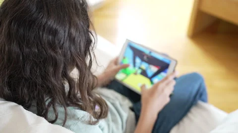 Boy playing video games with tablet Stock Footage 282904572