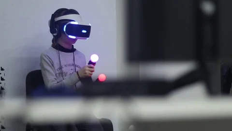 Boy playing a virtual reality Stock Footage 81790036
