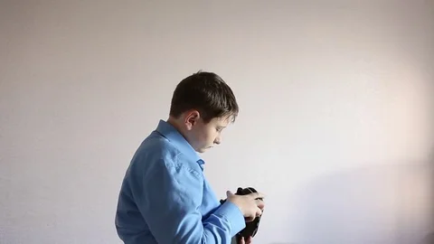 Boy playing a virtual reality glasses Video stock 71634889