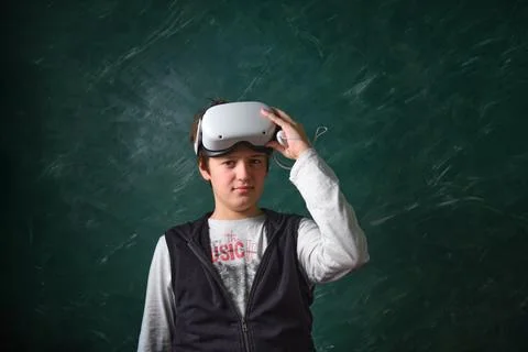 A boy playing with VR glasses 스톡 사진