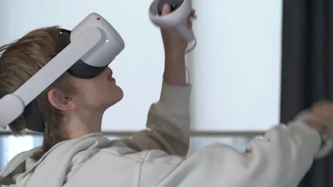 Boy playing with VR goggles 3 Stock Footage 146289661