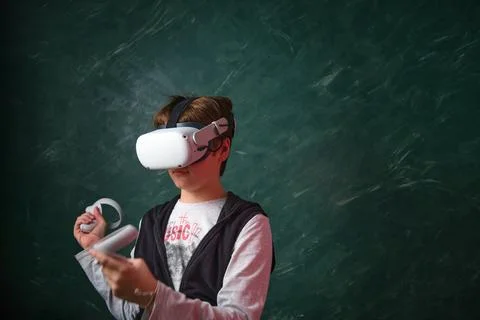 A boy playing with VR headset Foto stock