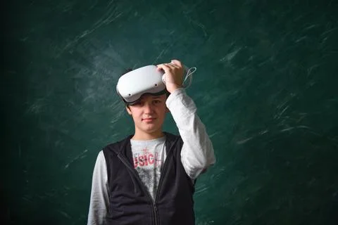 A boy playing with VR headset Stock-Fotos