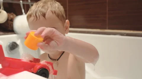 Boy playing in the water. 4K. Video stock 44404304