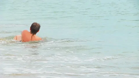 Boy playing in the water Stock Footage 22514163