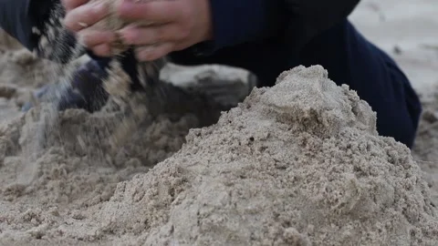 Boy playing in winter in the beach with sand Video stock 151589731
