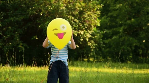 Boy plays with the balloon Stock Footage 68412998
