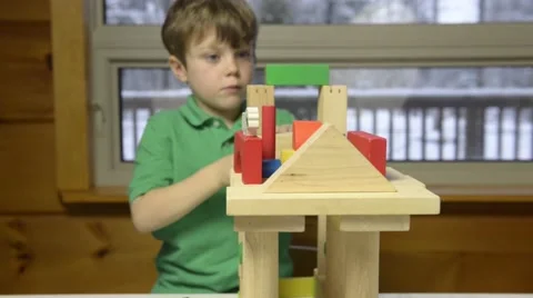 Boy plays with blocks Stock Footage 43965392