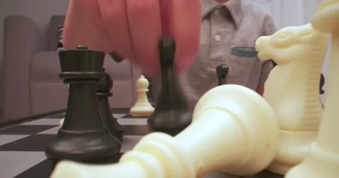 Boy plays chess. Chess figures extreme closeup. Stock Footage 212338567