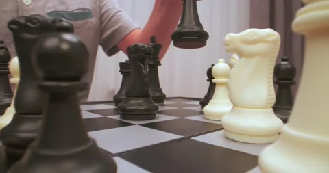Boy plays chess. Chess figures extreme closeup. Stock Footage 227835756