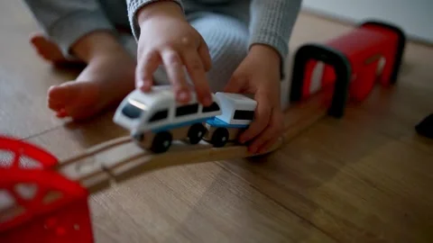Boy is plays with children's railway. Stock Footage 305689718