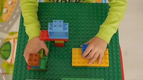 Boy plays constructor Stock Footage 98134629