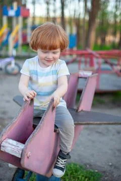 The boy plays Stock Photos