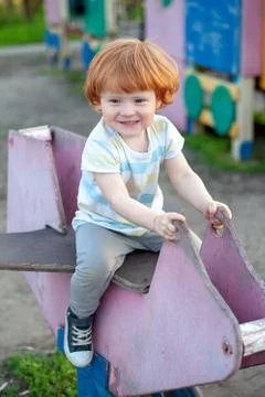 The boy plays Stock Photos