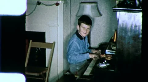 Boy Plays Piano MUSIC LESSON 1960s Vintage Retro Film Home Movie 3522 Stock Footage