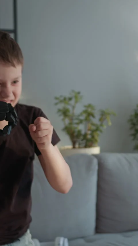 Boy Plays With Robotic Hand Stock Footage 335485043