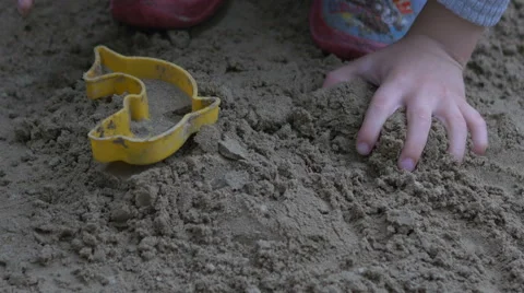 Boy plays in the sand Stock Footage 67655251