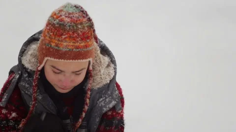 The boy plays in the snow in the winter. Stock Footage 101747338