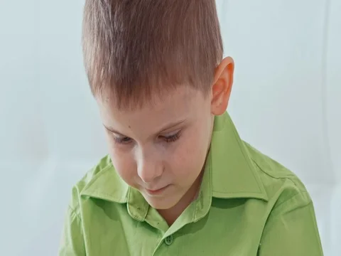 A boy plays on the tablet. Slow motion Stock Footage 73774526