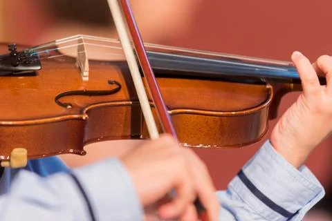 Boy plays violin Stock Photos