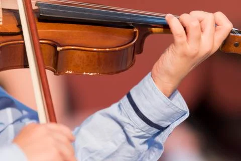 Boy plays violin Stock Photos
