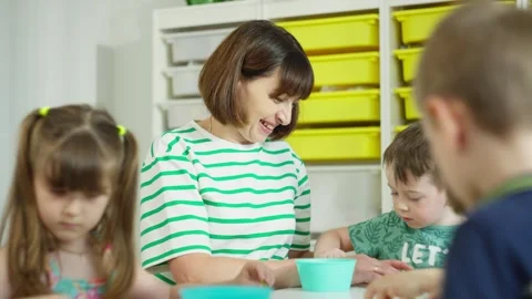 The boy plucks the parts to complete the task. Stock Footage 250999477