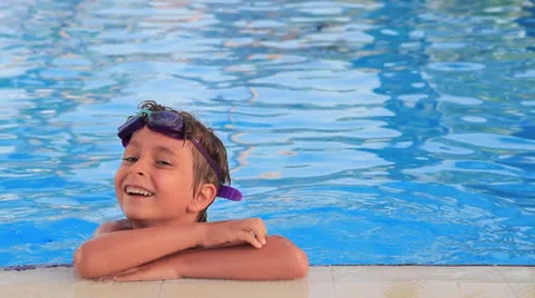 Boy in the pool Stock Footage 25480398