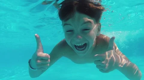 Boy in pool Stock Footage 64147204