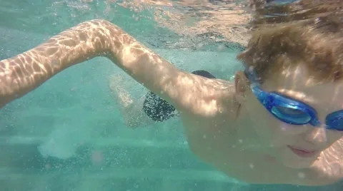 The boy in the pool. underwater view. Stock-Footage 65881822