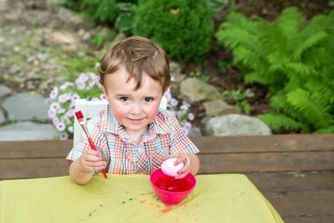 Boy Poses With His Pink Easter Egg Stock Photos