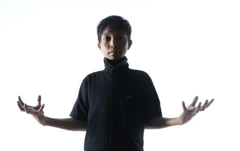 A boy posing with high-key lighting Stock Photos