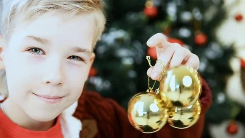 Boy posing near Christmas tree Stock Footage 82264664