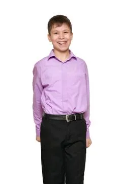 Boy posing on white background, black trousers and purple shirt Stock Photos