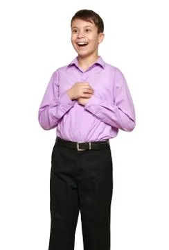 Boy posing on white background, black trousers and purple shirt Stock Photos