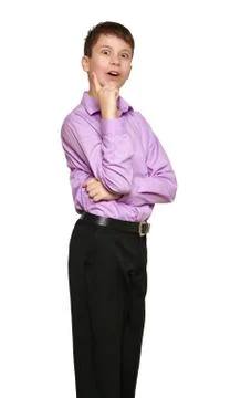 Boy posing on white background, black trousers and purple shirt Stock Photos