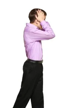 Boy posing on white background, black trousers and purple shirt Stock Photos