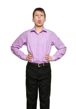 Boy posing on white background, black trousers and purple shirt Stock Photos
