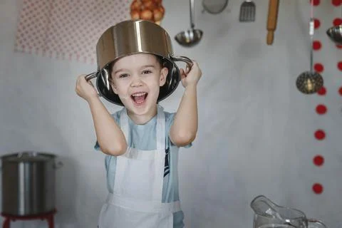 Boy with a pot on his head Stock Photos