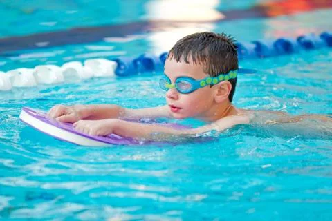 Boy Practice Swimming Stock Photos