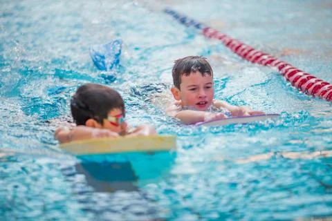Boy Practice Swimming Stock Photos