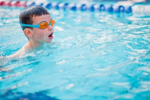 Boy Practice Swimming Stock Photos