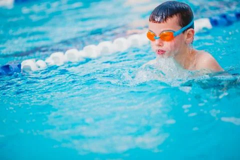 Boy Practice Swimming Stock Photos