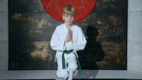 Boy Practicing Aikido Is Training With Bokken Sword Stock Footage 76209262