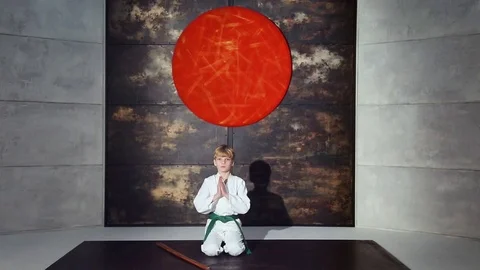 Boy Practicing Aikido Is Training With Bokken Sword Stock Footage 76209269