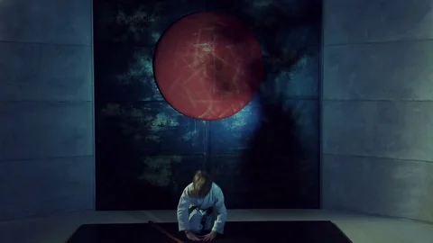 Boy Practicing Aikido Is Training With Bokken Sword Stock Footage 76209284