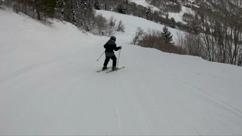 Boy practicing snow skiing turning. 스톡 동영상 168855548